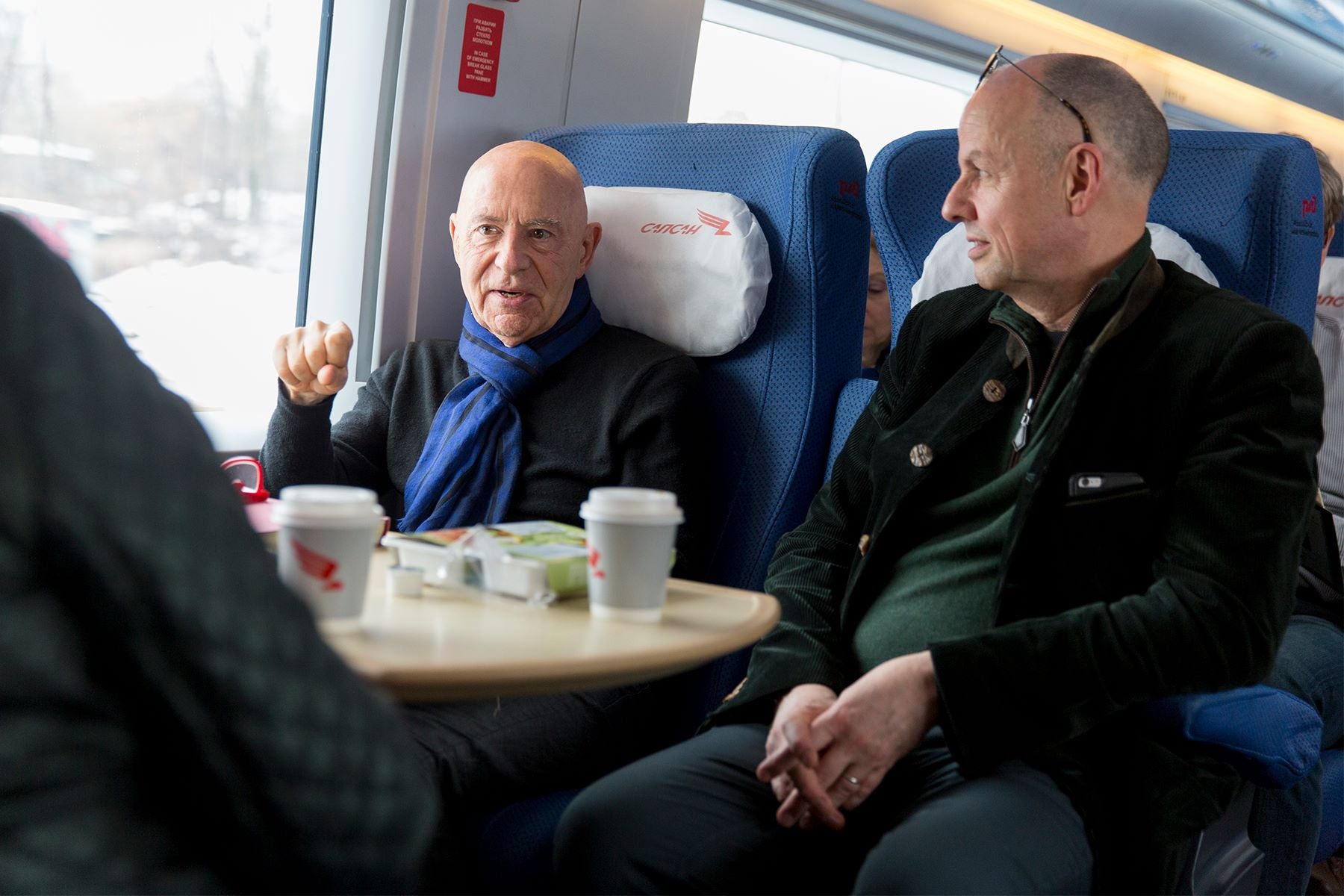 Nigel Boon on a train in Russia with previous NSO Music Director Christoph Eschenbach